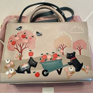 Radley London “To the Core” leather handbag.